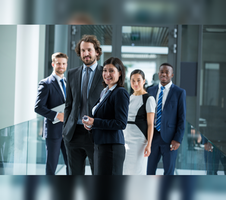 confident-businesspeople-standing-in-office-2026-01-09-10-37-14-utc_with_bgc